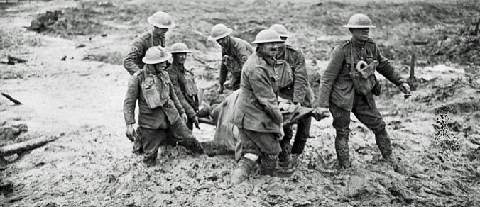 Stretcher bearers in mud